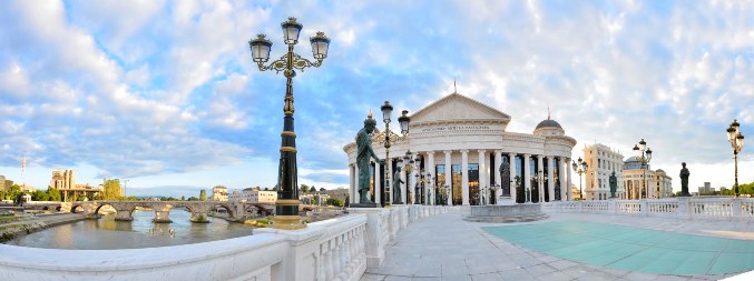 beautiful old stone bridge and archaeological museum of Macedonia, sunrise panorama with bright colorful sky